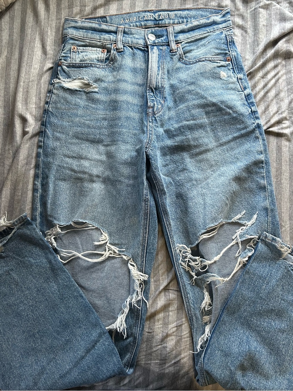 American Eagle Outfitters High-Rise Distressed Light Blue Jeans